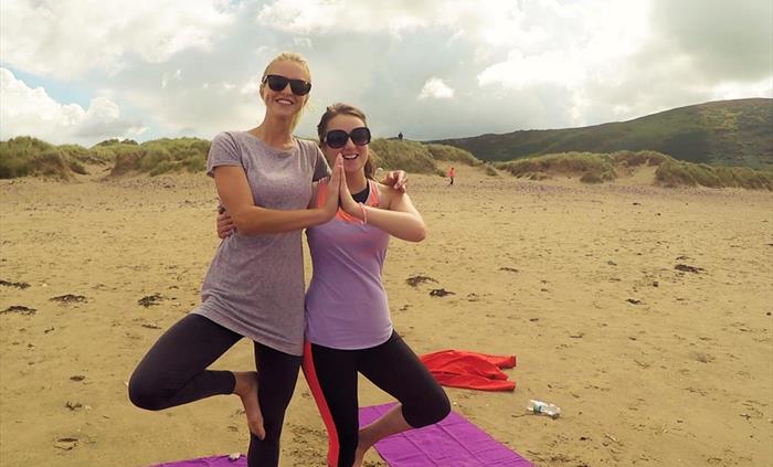 Beach yoga on a Corporate Retreat in Gower